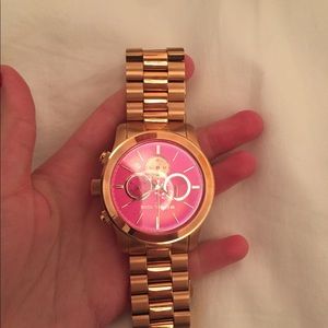 Michael Kors rose gold and pink faced watch
